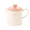 Teiera in fine stoneware disponibile in rosa con coperchio bianco o bianco con coperchio rosa, decorata con un cuore sul coperchio.