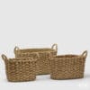 Set di tre cCrettangolari in giacinto acquatico con manici intrecciati, ideali per organizzare e decorare la casa.