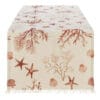 Runner rettangolare in cotone con motivi marini e frange, perfetto per tavole dal fascino costiero.