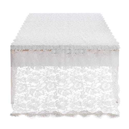 Runner Blanc Mariclò collezione Dentelle, bianco ricamato, appoggiato su un tavolo e utilizzabile come stola decorativa.