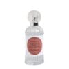Bottiglia di profumo per tessuti Mathilde M. Fruits des Bois da 75 ml, posizionata in un cesto decorativo con bacche rosse e fragole, su uno sfondo naturale con dettagli floreali.
