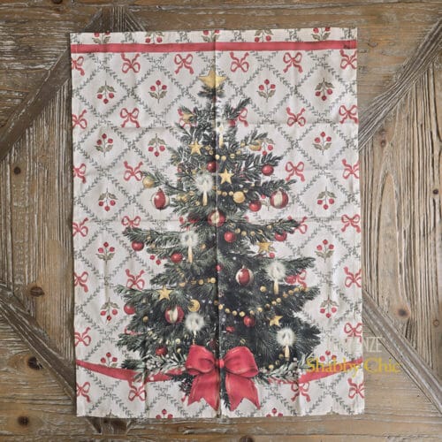 Canovaccio natalizio con stampa di albero di Natale addobbato e sfondo a rombi con fiocchi rossi e bacche.