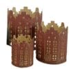 Set di porta candele rossi in metallo con motivo a palazzi stilizzati e interno dorato riflettente, stile vintage.