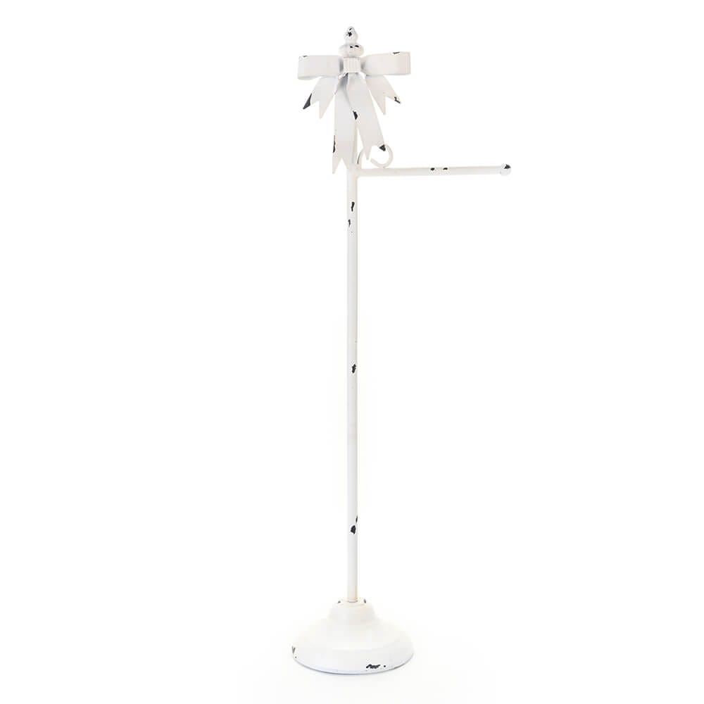 Portarotolo da terra in metallo bianco con fiocco decorativo in stile shabby chic e finitura antichizzata.