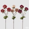 Rami decorativi con anemoni in velluto e foglie verdi, disponibili nei toni malva, rosa e viola.