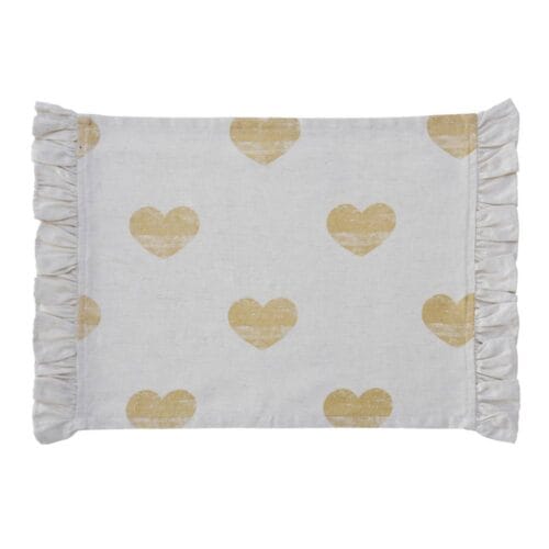 Tovaglietta americana Blanc MariClo in cotone naturale con cuori dorati stampati e bordo arricciato sui lati corti.