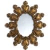 Specchio ovale con cornice decorata da cuori dorati in rilievo, stile barocco e finitura anticata.