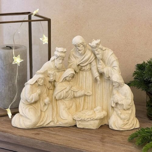 Presepe in resina dallo stile vintage con effetto pietra, raffigurante la Natività con personaggi scolpiti in rilievo.