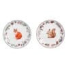 Set di due piatti in ceramica decorati con disegni di volpe e scoiattolo, circondati da motivi floreali autunnali.