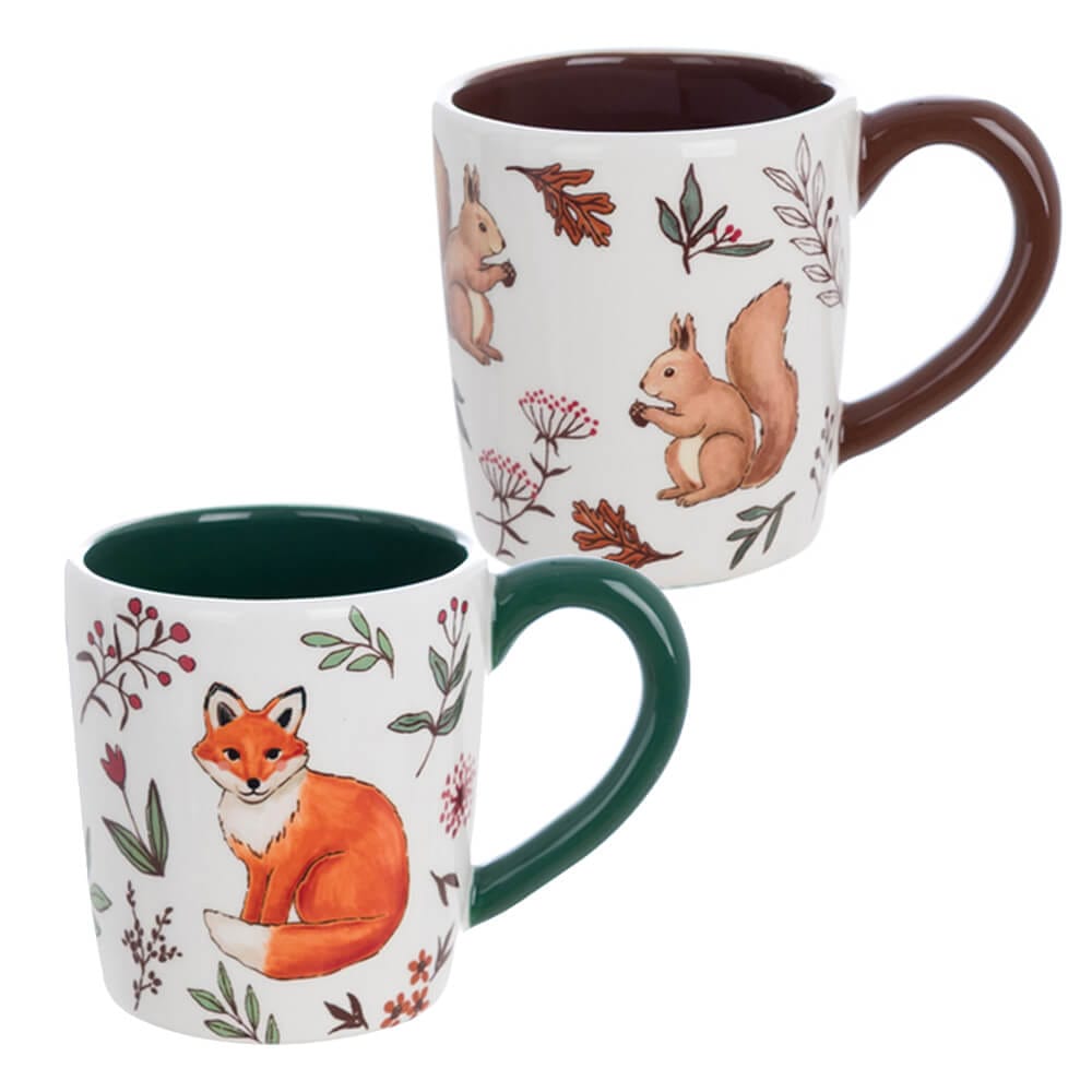 Set di due piatti in ceramica decorati con disegni di volpe e scoiattolo, circondati da motivi floreali autunnali.