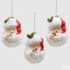 Decorazione natalizia in vetro raffigurante Babbo Natale con cappello rosso, disponibile in tre varianti con biscotto, tazza o pipa.