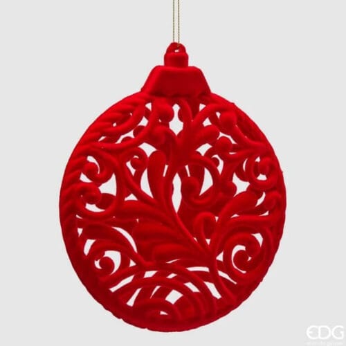Medaglione decorativo natalizio in velluto rosso con disegno traforato a volute floreali.