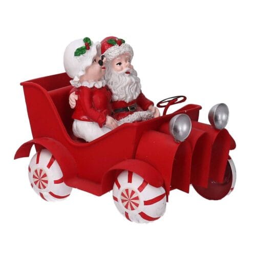 Decorazione natalizia in resina con Babbo e Mamma Natale in macchina rossa con ruote caramella