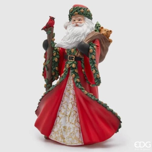 Figura decorativa natalizia in poliresina con Babbo Natale, bastone con uccellino rosso, sacco con doni e veste rossa decorata.