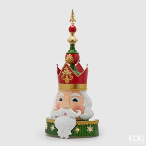 Decorazione natalizia EDG a forma di testa di soldatino con corona rossa e dettagli oro, base verde con fiocchi di neve e punta a lancia.