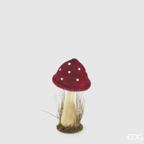 Decorazione natalizia a forma di fungo con cappello in velluto rosso a pois bianchi e base naturale con muschio.