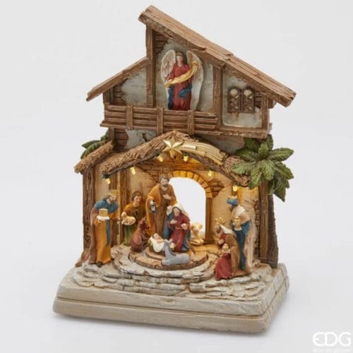 Presepe EDG con struttura a due piani, personaggi colorati, angelo in alto, luci LED e movimento con funzione musicale, base rettangolare.