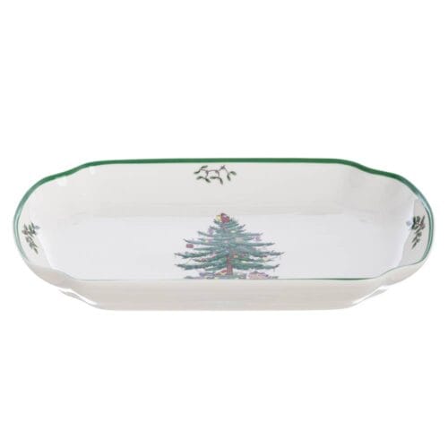 Vassoio natalizio in ceramica decorato con albero di Natale, rametti di agrifoglio e bordo verde sagomato.