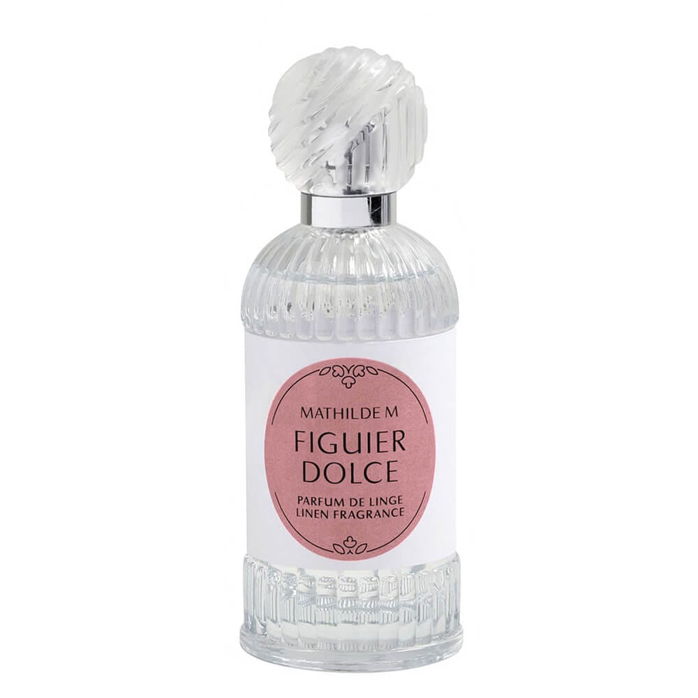 Mathilde M Profumo per Tessuti 75 ml - Figuier Dolce 1 Flacone in vetro decorato con etichetta rosa e tappo trasparente rigato contenente il profumo per tessuti Mathilde M Figuier Dolce.