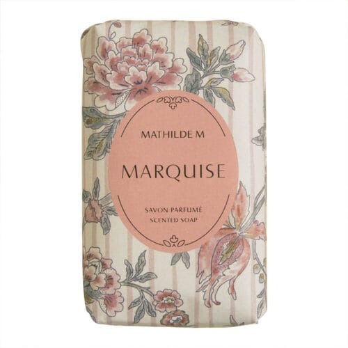 Sapone profumato Mathilde M da 100g, confezionato in carta decorativa floreale, con cameo in rilievo scolpito sulla superficie.