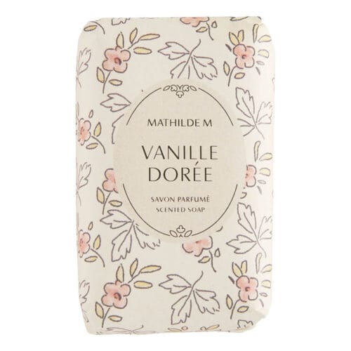 Saponetta rettangolare bianca con rilievo decorativo e profilo femminile, confezionata in carta avorio con fiori rosa e foglie stilizzate dorate.