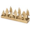 Portacandela centrotavola in metallo dorato con sagome di alberi di Natale e 4 spazi per tealight. Collezione Darling, stile rustico e festivo.