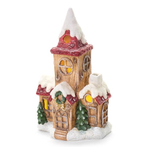 Casa natalizia in resina con luci LED calde, tetti innevati e abeti decorativi, collezione Storia di Natale.