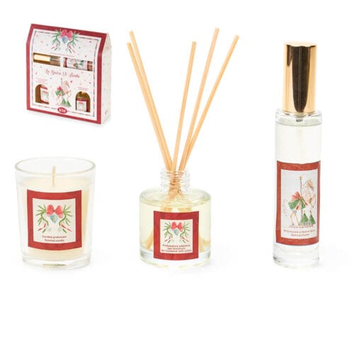 Set regalo natalizio composto da candela profumata, diffusore con bastoncini e spray ambiente, decorato con grafiche festive in stile vintage.