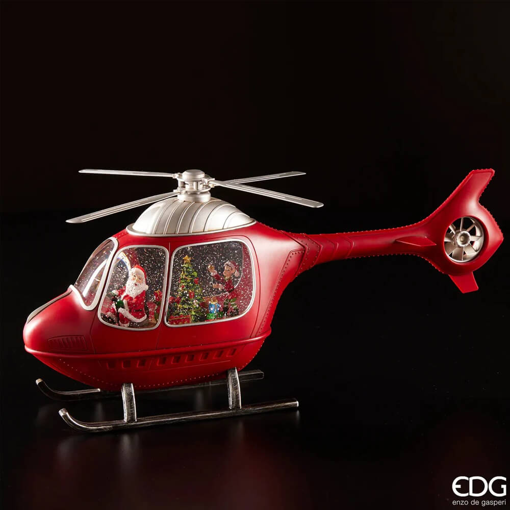 EDG Elicottero Natale LED con Musica H23 cm 1 Elicottero decorativo natalizio rosso con Babbo Natale e albero illuminato all’interno, luci LED e neve glitterata.