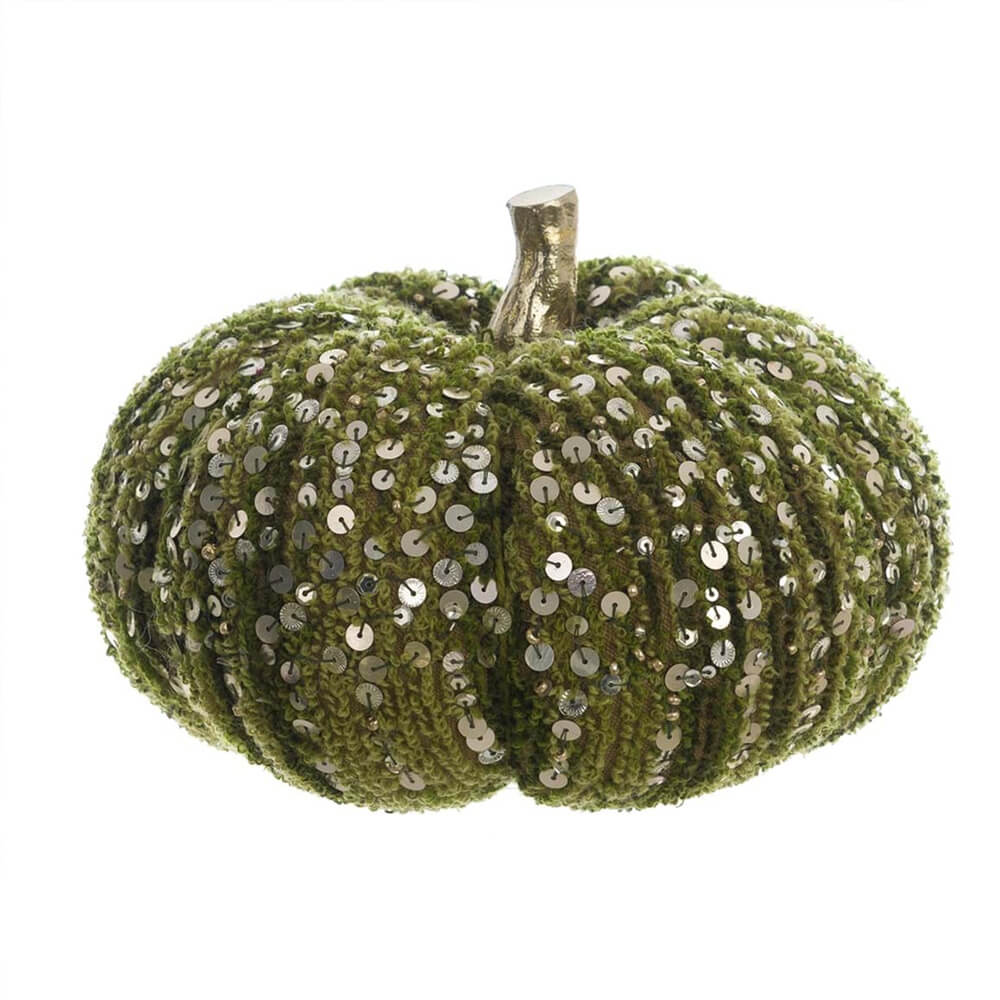 Blanc MariClo Zucca Verde Paillettes 18x14 cm 1 Zucca decorativa in tessuto bouclé verde con paillettes brillanti e gambo dorato, ideale per decorazioni autunnali chic.