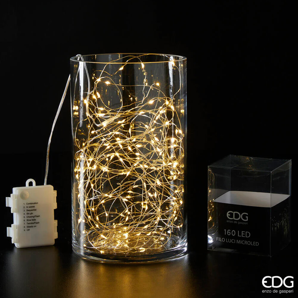 Hilo luminoso con 160 microLED cálidos en cable marfil, temporizador 8 modos, perfecto para decoraciones.