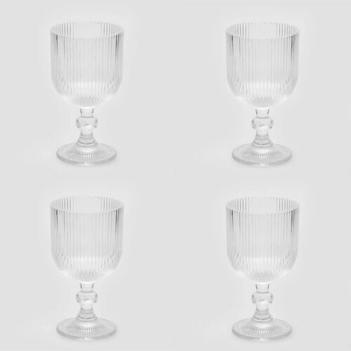 Set da 4 calici in vetro trasparente con righe verticali e base lavorata, stile elegante e rétro.