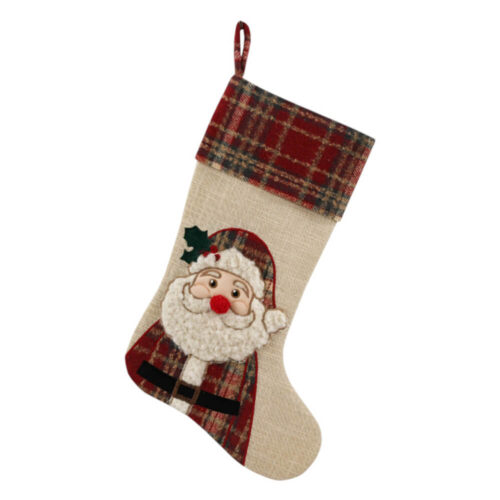 Bas de Noël Clodette en tissu beige avec bordure en Tartan et application du Père Noël avec barbe bouclée et nez à pompon rouge.