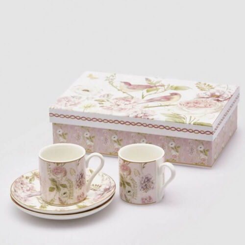 Set di due tazzine da caffè con piattino in porcellana, decorato con motivi floreali e confezionato in scatola regalo a tema botanico.