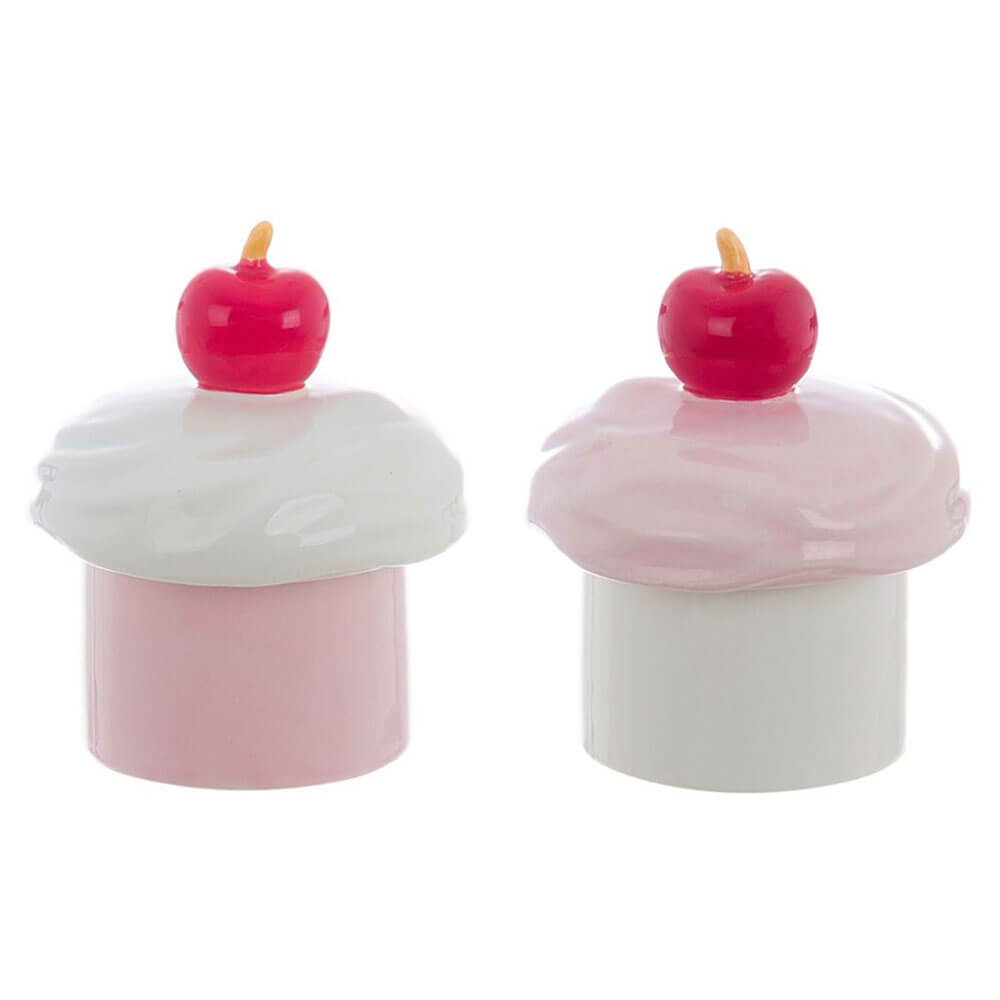Vela perfumada en tarro de cerámica rosa y blanco con forma de magdalena y cereza en la tapa, Blanc MariClò.