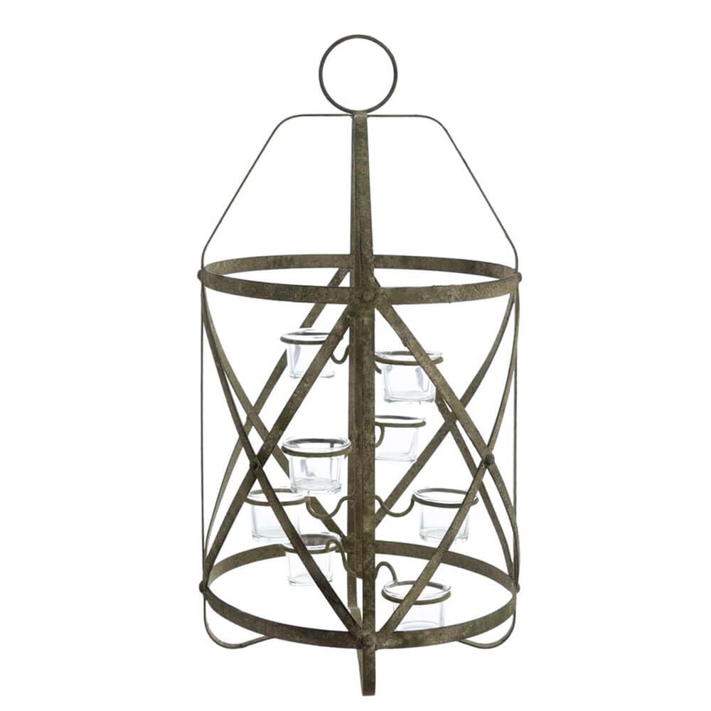 Lanterna decorativa in metallo con struttura geometrica traforata e porta tealight in vetro, stile shabby chic.