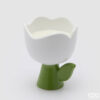 Candela EDG in ceramica a forma di tulipano bianco con base verde e cera bianca, profumazione Frangipani.