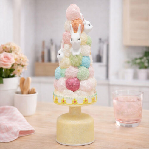 Decoro topiary pasquale giallo in vetro con coniglietti, sfere glitterate e luce LED su base cilindrica.