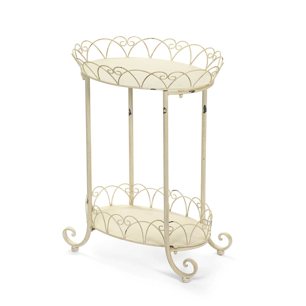 Nuvole di Stoffa Table basse en métal 43x34x58h 1 Table basse ancienne en métal ivoire avec deux étagères ovales et bords bouclés, Nuvole di Stoffa, 43x34x58 cm.