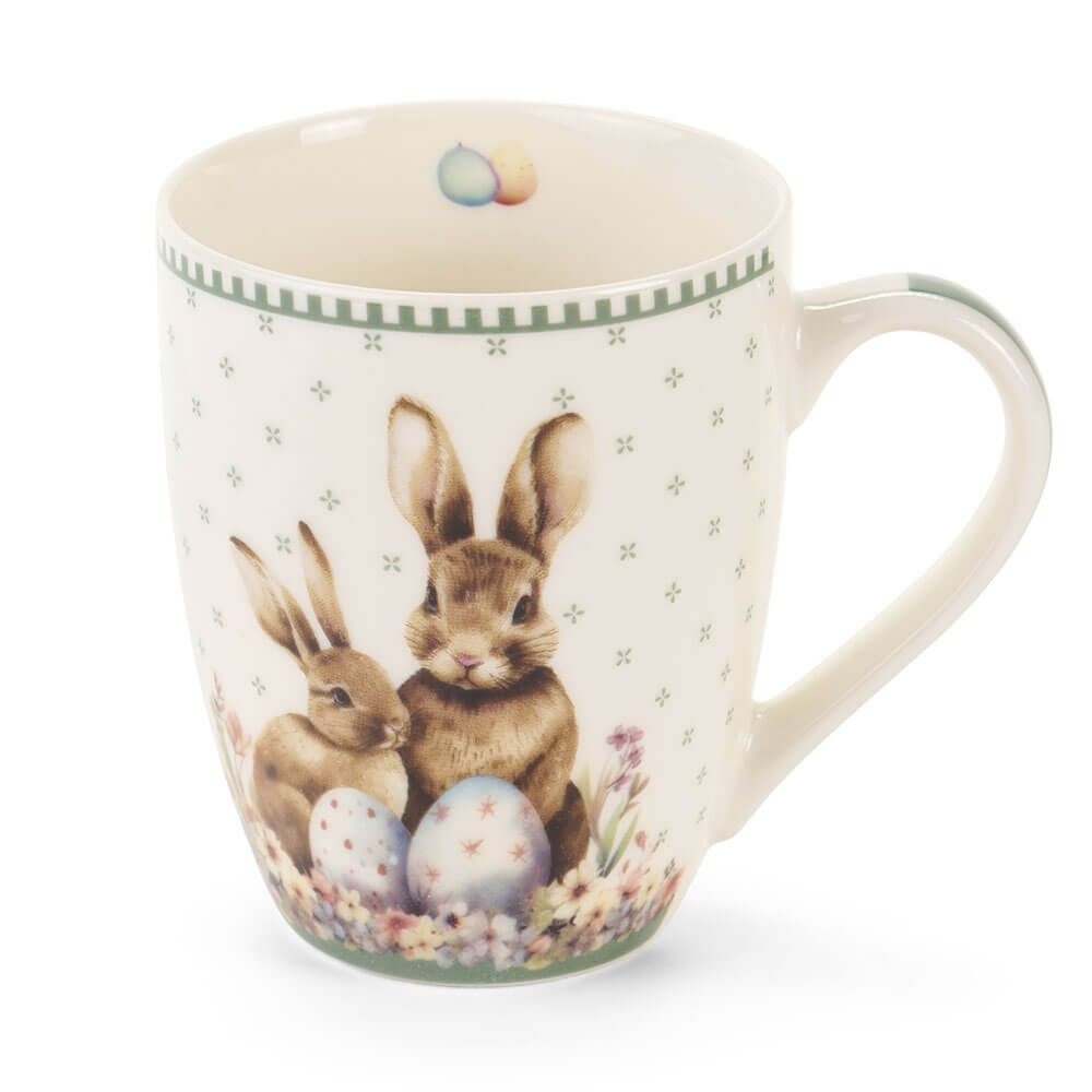 Taza de porcelana verde PePen Nuvole di Stoffa con conejitos, huevos decorativos y caja de regalo a juego.