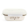 Contenitore in ceramica stoneware color crema con tappo in plastica e scritta decorativa “Gusto al top”, stile shabby chic.