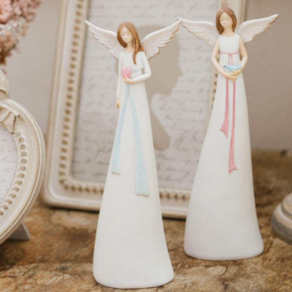 Angelo decorativo Nuvole di Stoffa in resina bianca con ali, cuore rosa o uccellino azzurro e nastro color pastello.