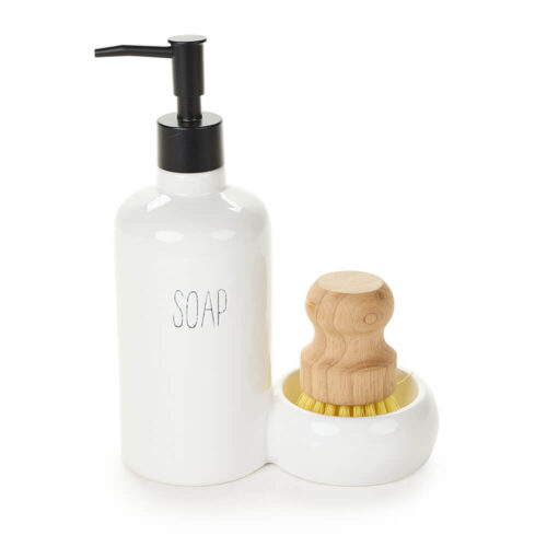 Dosa-sapone in ceramica bianca con pompa nera e spazzola in legno naturale coordinata.