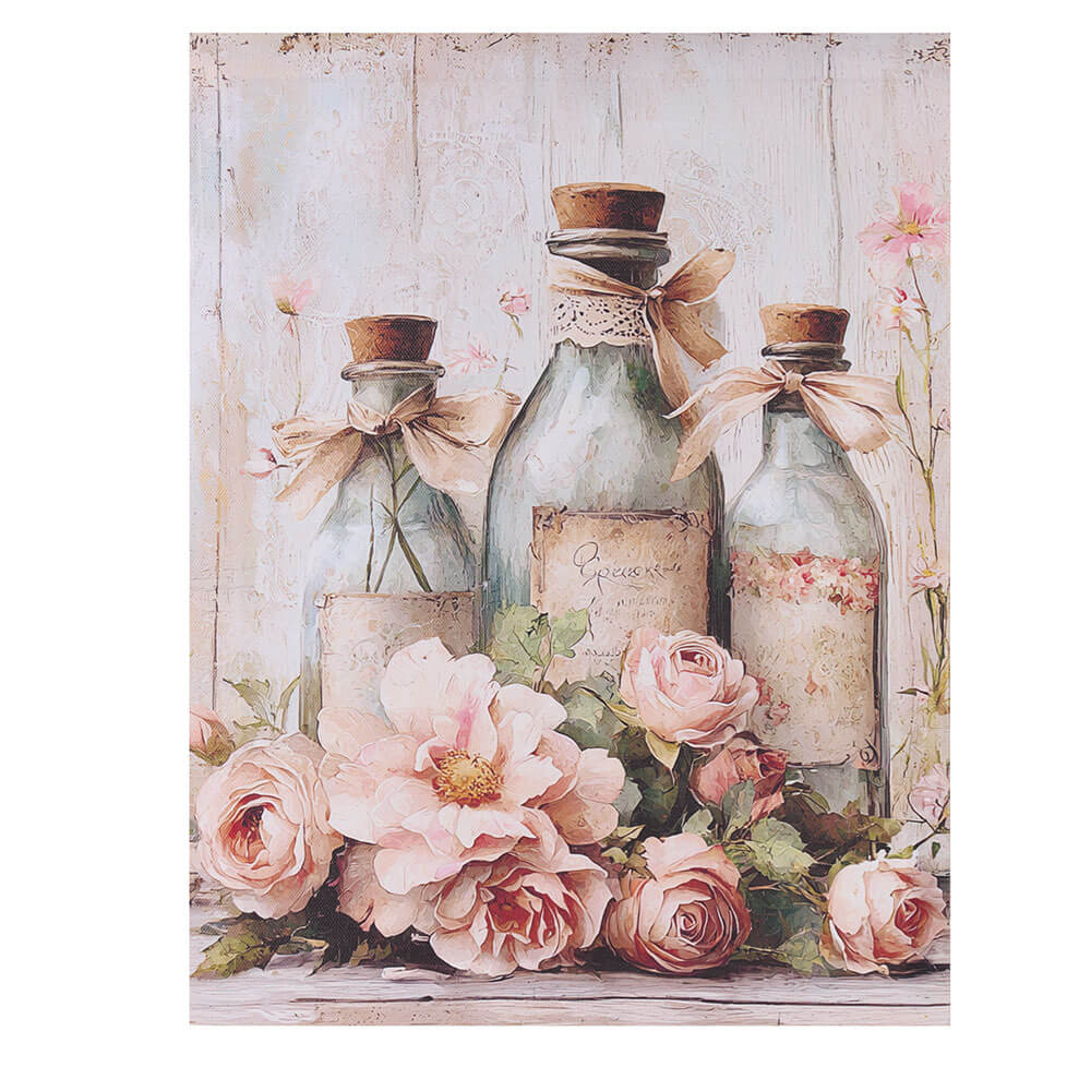 Nuvole di Stoffa peinture 3 bouteilles Shabby 27x35 1 Peinture sur toile de style shabby avec trois bouteilles en verre, des noeuds et des roses roses sur un fond en bois clair, format 27x35, prête à être accrochée.