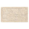 Tappeto bagno beige rettangolare con motivo floreale in rilievo, stile shabby chic.