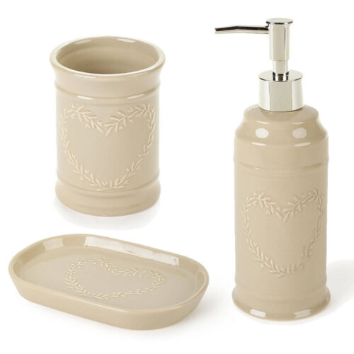 Set bagno Nuvole di Stoffa in ceramica beige con dosasapone, portasaponetta e portaspazzolini decorati con motivo a foglie.