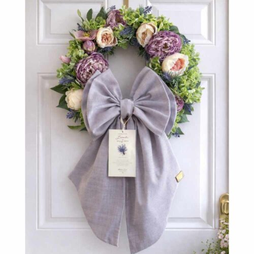 Ghirlanda 45 cm con fiori nei toni lilla e rosa e fiocco glicine, Madame Fioccò