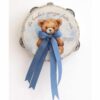 Tamburello Tenerezza di Teddy celeste Ø13 cm con fiocco in nastro e frase Un bimbo è carezza fatta vita Madame Fioccò