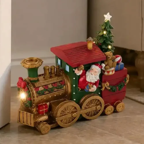 Locomotiva natalizia con Babbo Natale LED e musica 27 cm