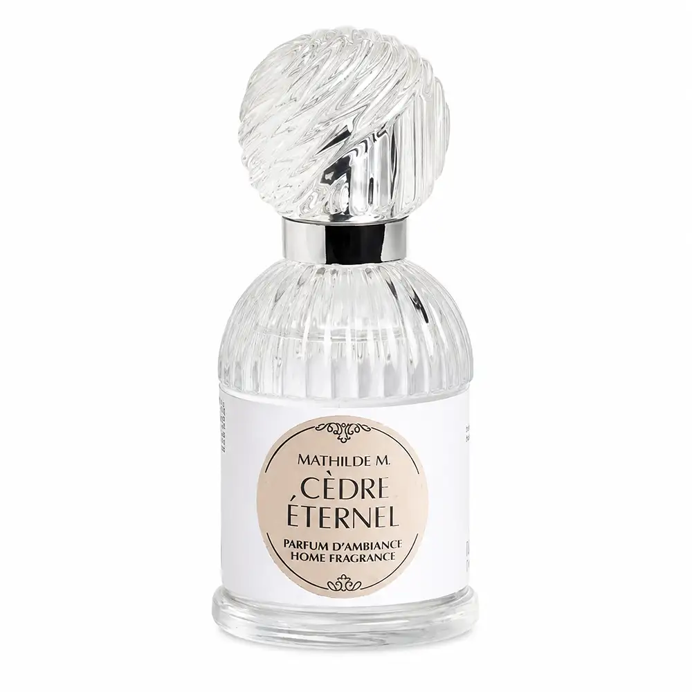 Ambientador Mathilde M Cèdre Éternel de 30 ml en frasco de cristal acanalado, con tapón decorativo transparente y detalles plateados.